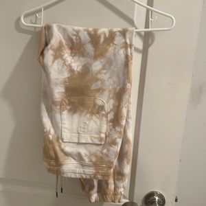 Vuori activewear tie dye heavier material. Runs on smaller size